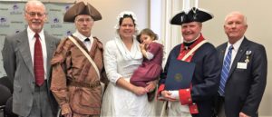 (Left to right) Chapter secretary-treasurer Dale Smith, member Gary Timmons, Jessica and Emily Keller of Fort Henry Days Living History, chapter president Jay Frey and chapter genealogist Gary Auber